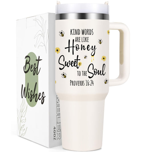 A product display of a cream-colored 40oz stainless steel tumbler with a handle, featuring bee and sunflower illustrations and the Bible verse "Kind words are like honey sweet to the soul, Proverbs 16:24," standing next to its branded gift box labeled "Best Wishes.