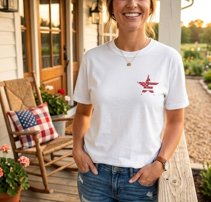 Woman wearing a white faith-based graphic t-shirt featuring a patriotic star design on the front