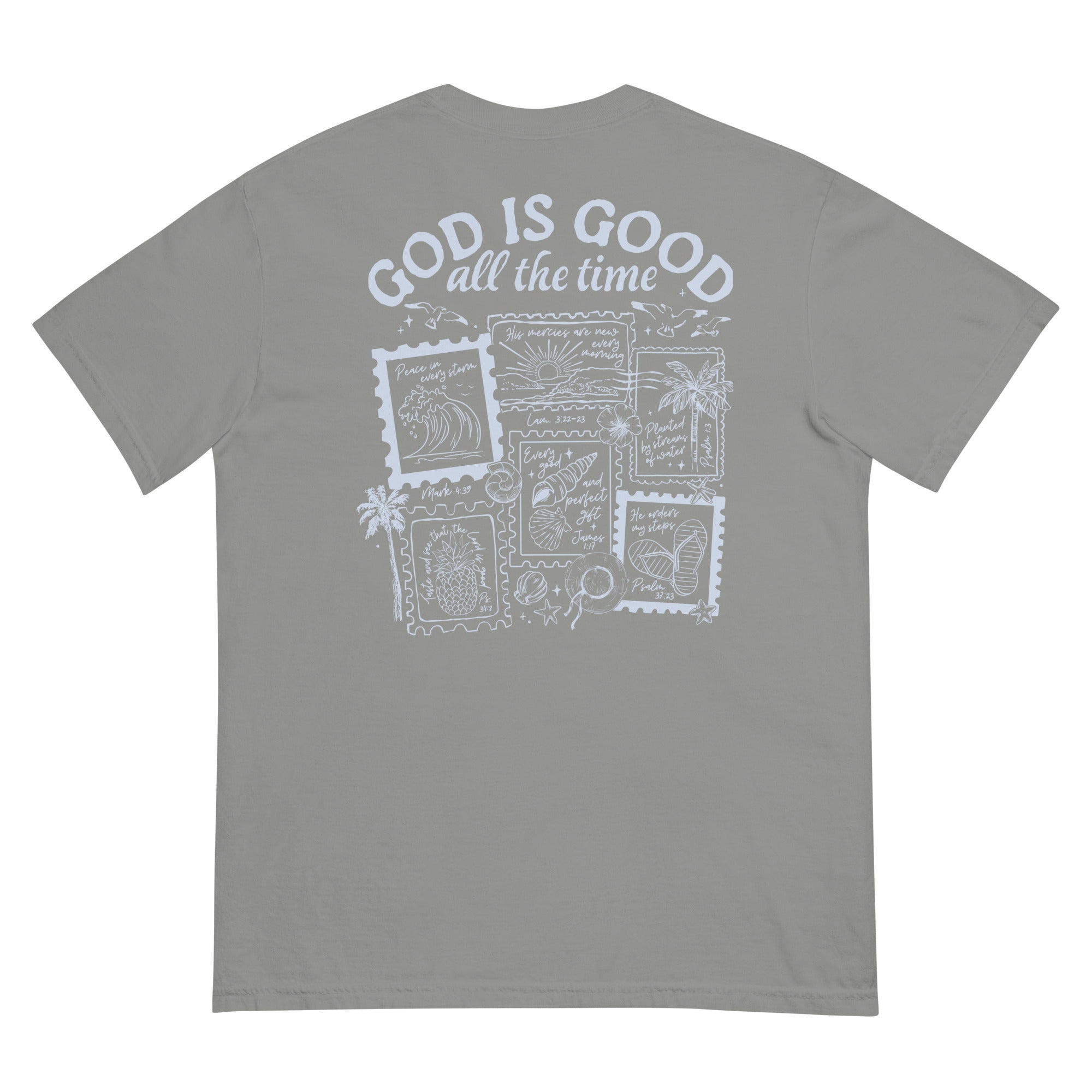 Flat lay back view of a grey inspirational Christian apparel shirt featuring a detailed "God is Good all the time" coastal stamp graphic.