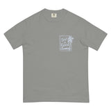 Flat lay front view of a grey unisex Christian t-shirt featuring a "God is Good" palm tree stamp design on the chest