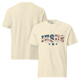 An ivory-colored unisex garment-dyed heavyweight t-shirt with a distressed patriotic "JESUS" print and star detailing