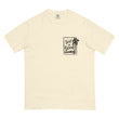 Flat lay front view of a cream minimalist Christian graphic tee with a black "God is Good" palm tree stamp design.