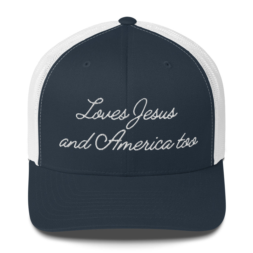 Front view of a navy and white retro trucker hat, Christian apparel with Loves Jesus and America too embroidery.