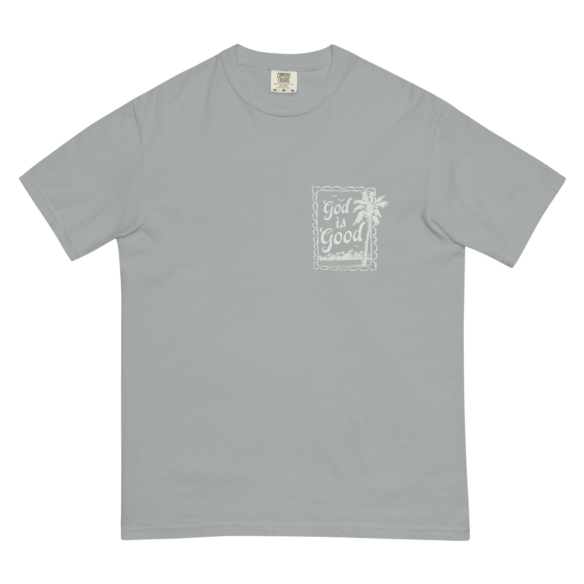 Flat lay front view of a sage green unisex Christian t-shirt featuring a "God is Good" palm tree stamp design.